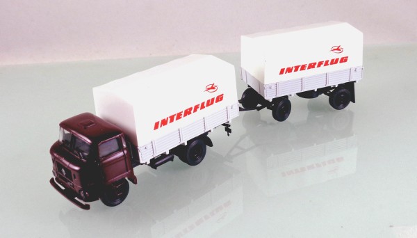 H0: FG000064 W50L Hängerzug Pritsche / Plane "Interflug"